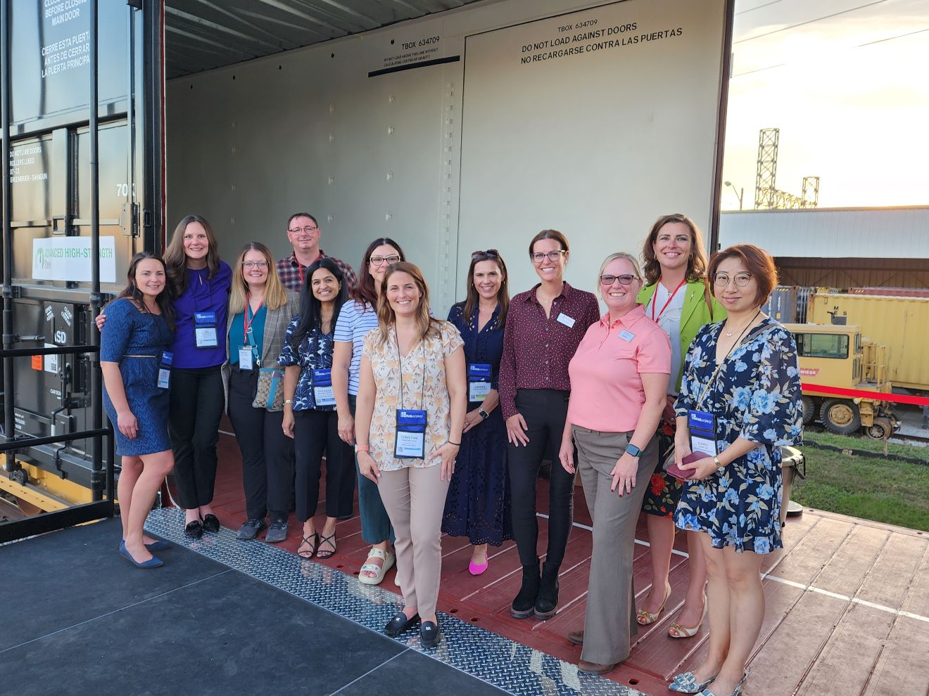 Katie Kachel poses with a group at the Annual LRW Railway Women Conference at Railway Interchange, October 2023.